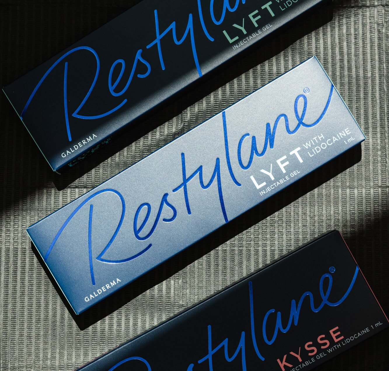 A box of filler for wedding day facial prep in Chapel Hill